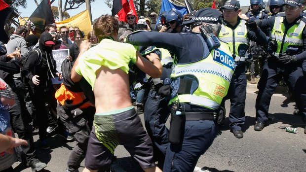 Protesters from Reclaim Australia and the No Room for Racism group clash  during a rally held in Melton in November last year.