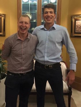 Mr Fitton, right, celebrating the victory with colleague Dean Shachar, who also works for NSW MP Mark Taylor.