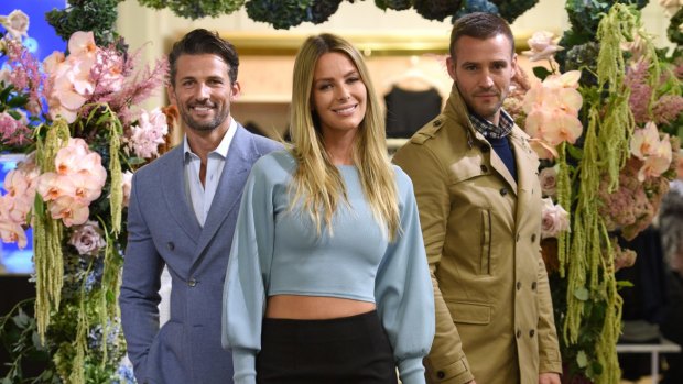 Jennifer Hawkins flanked by Kris Smith and Tim Robards on the runway at the Myer City store for the public preview of the autumn- winter collection.