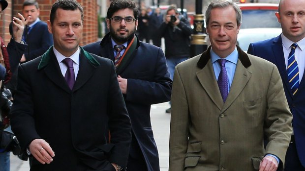 Steven Woolfe, left, and former UKIP leader Nigel Farage walk the streets of London in the lead-up to the Brexit vote.