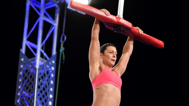 Jenna Douros attempts the silk slider during Australian Ninja Warrior heats.
