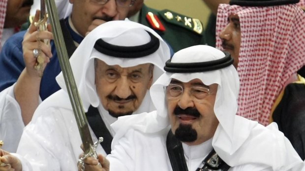 The late King Abdullah, right, in Riyadh in 2010.