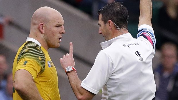 Controversial: Referee Craig Joubert speaks to Australia's captain Stephen Moore.