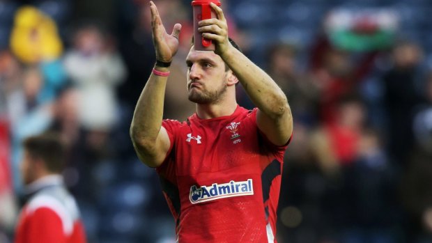 Wales captain Sam Warburton applauds the travelling fans following his team's 26-21 victory over Scotland at Murrayfield, Edinburgh.