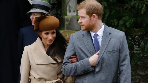 Meghan Markle and Prince Harry arrive for the royal family's traditional Christmas Day service at St Mary Magdalene Church in Sandringham on Monday.