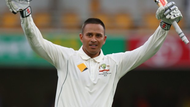 Life's ambition: Usman Khawaja notched his maiden Test century on day one against New Zealand at the Gabba.