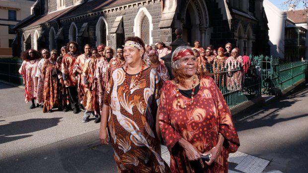 The Central Australian Women's Aboriginal Choir outside the German Lutheran Trinity Church in Melbourne.
