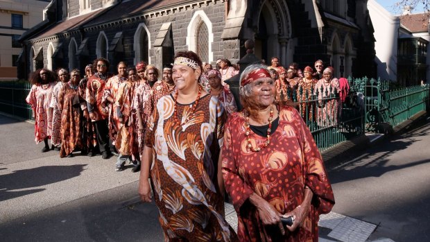 Stars of The Song Keepers, the Central Australian Women's Aboriginal Choir, outside the German Lutheran Trinity Church in Melbourne.