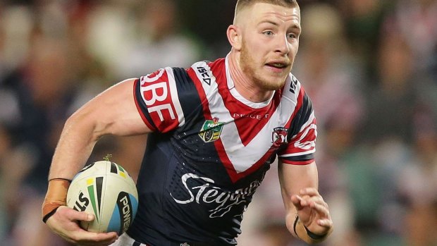 Out of favour: Jackson Hastings on the charge for the Roosters.
