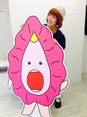 Megumi Igarashi with one of her drawings.