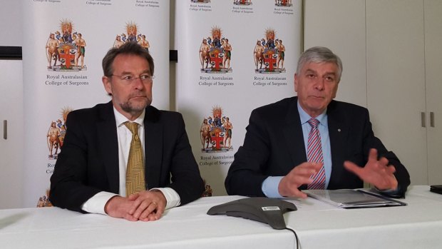 Royal Australasian College of Surgeons president David Watters, left, and Rob Knowles, chairman of the college's expert advisory group on bullying. 