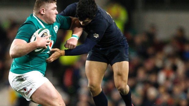 Ireland's Tadhg Furlong, is tackled by Matias Moroni of Argentina.