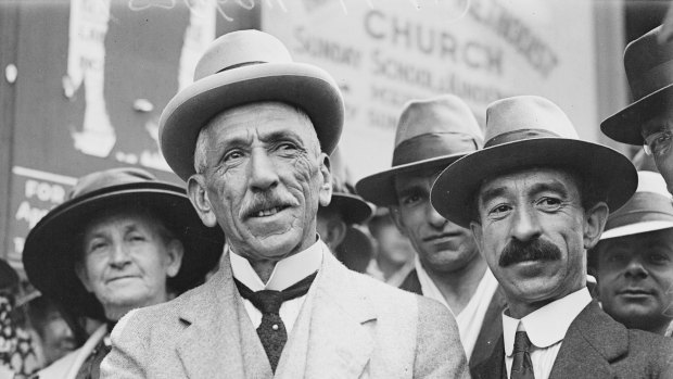 Australian prime minister Billy Hughes stands among the crowd that gathered in Sydney to greet him after his return from the Paris Peace Conference in 1919.