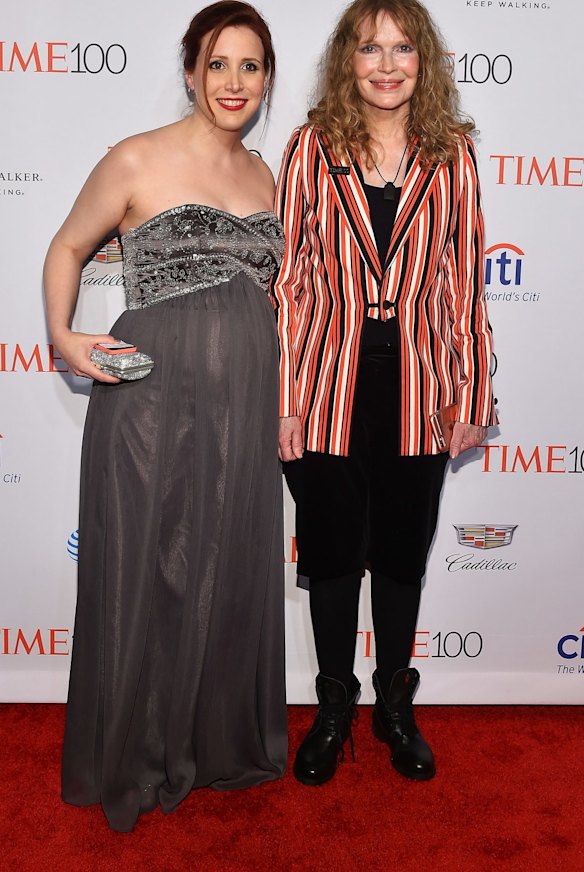 Dylan Farrow (L) and mum, Mia Farrow.