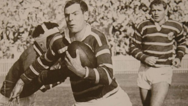 A special talent: Ken Thornett fends off a South Sydney defender at the Sydney Cricket Ground during his reign.