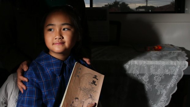 Carole Lu, pictured with her daughter Georgia, is worried about the secrecy surrounding the Chinese government's program of Confucius Classrooms in NSW schools. 