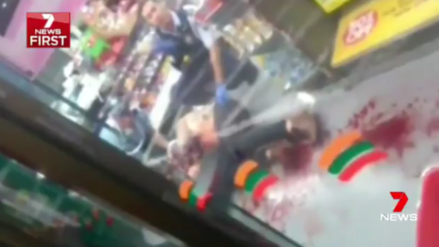 The wounded man inside Enmore 7-Eleven service station.