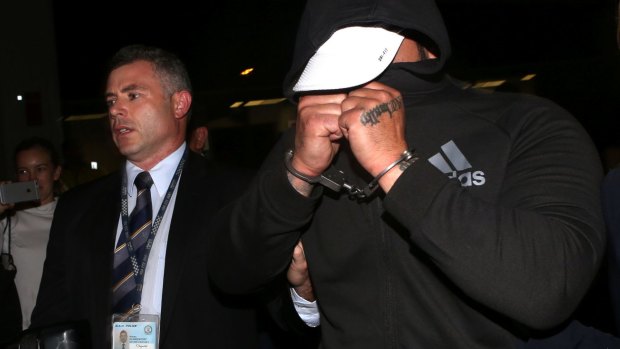 Mahmoud Ahmad, 34, was arrested at Sydney International Airport on Monday night.