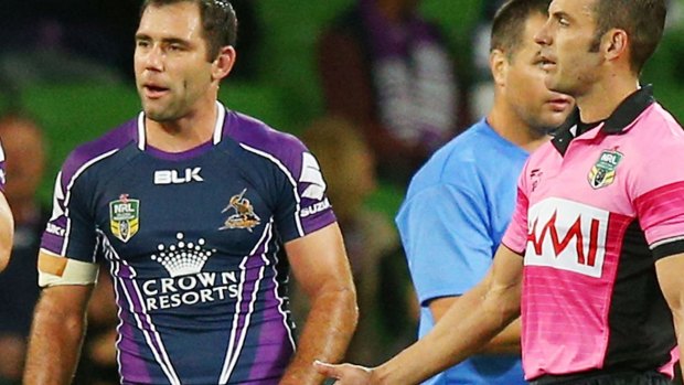 Caught in the middle: Cameron Smith.