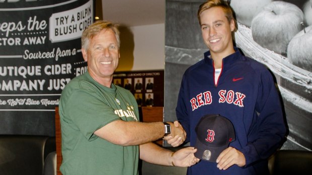 Heading Stateside: Australian baseball coach and Boston Red Sox scout Jon Deeble welcomes Canberra pitcher Brad Inglis to the Red Sox.