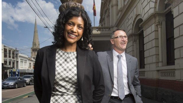 Greens candidate for Wills, Samantha Ratnam, seen here with party leader Richard Di Natale, has pulled out of an anti-racism rally.