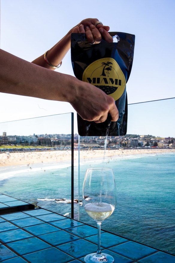 Decanting the wine from cask to glass.