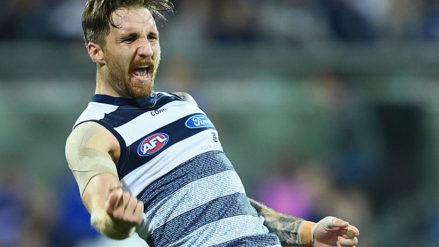 Geelong's Zach Tuohy is fired up after a long goal against the Bulldogs on Friday night.
