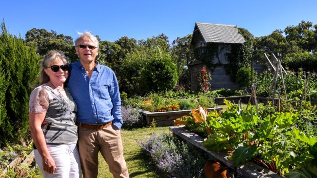 Warwick and Sue Forge in their garden in Merricks North. The pair are looking for new owners for the Australian Landscape Conference.