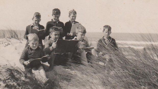 Dave Roberts (right) attends a study session in the sand dunes. 