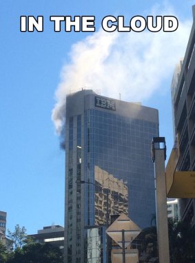 Workers at Brisbane's IBM building were evacuated after fire broke out on the 13th floor on Tuesday