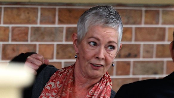 Anne Melocco,  Roger Rogerson's wife, leaves the Supreme Court during the trial.