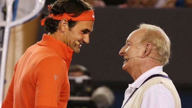 Rod Laver with Roger Federer  during a charity match at Melbourne Park in 2014.