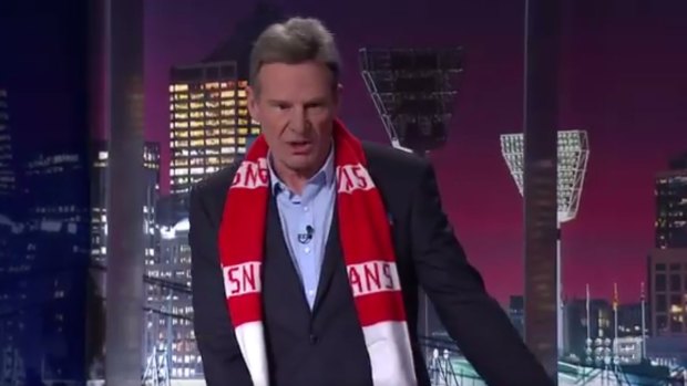 Sam Newman has said Australians have "gone mad" following the controversy surrounding Malcolm Turnbull's footy photo. 
