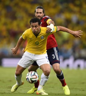 Uruguay in yellow shirts: The maligned Brazilian Fred.
