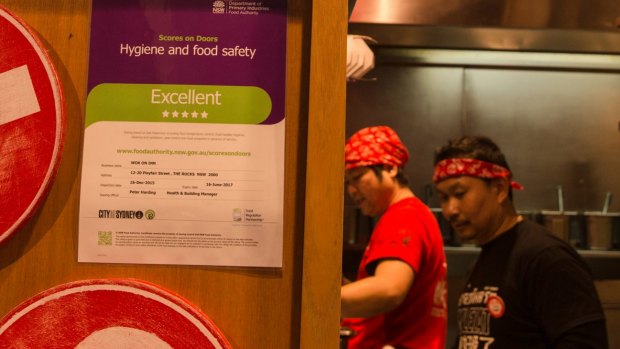 Wok on Inn at the Rocks displays its Scores on Doors food safety rating.