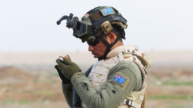 A soldier from the Iraq Security Forces Nineveh Operations Command trained by Australian and New Zealand forces at Camp Taji, north of Baghdad. 
