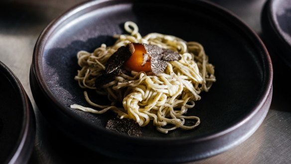 Tajarin pasta with truffle butter and truffled egg yolk at the Agrarian Kitchen.