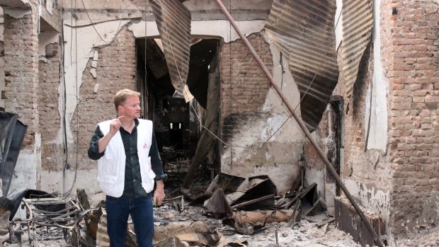 Christopher Stokes, the general director of the medical charity Medecins Sans Frontieres, stands amid the charred remains of the organisation's hospital  in Kunduz, Afghanistan.