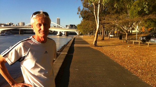 Jogger Mark Knight (at Riverside Drive at South Bank) says the new apartment developments will ease the strain on public transport. 