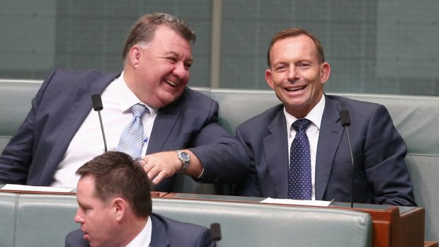 Mr Kelly in discussion with former prime minister Tony Abbott  during question time in November.