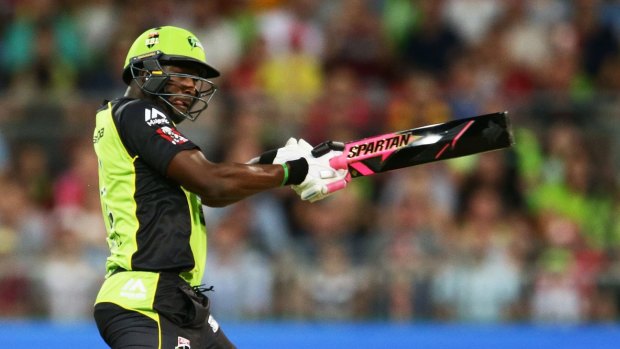 Andre Russell with his black and pink bat.