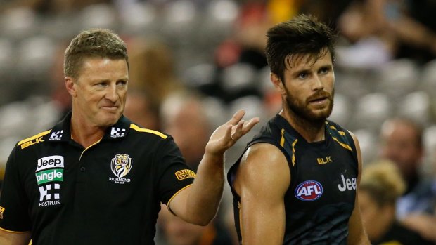 Richmond coach Damien Hardwick on the sidelines with skipper Trent Cotchin.