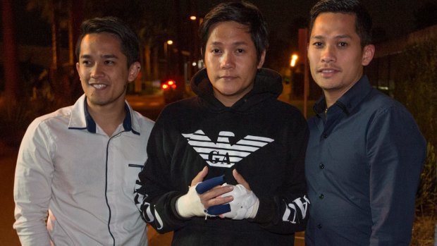 Nou Loeung (centre) is released on bail from Silverwater Correctional Complex. 