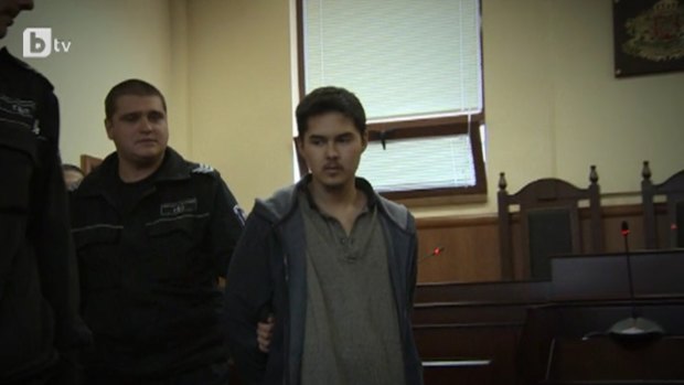 John Zakhariev being led into court in Bulgaria to face terrorism charges.