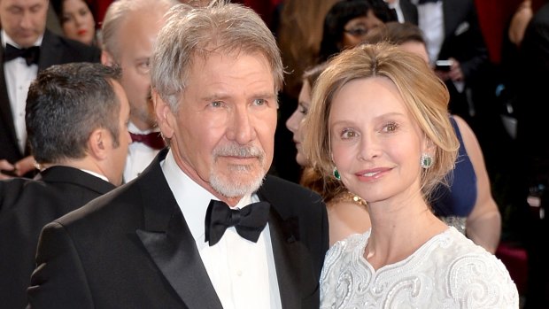 Harrison Ford and wife Calista Flockhart attend the Oscars on March 2, 2014.