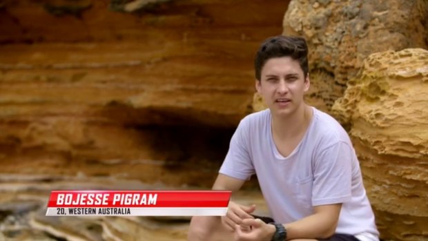 Bojesse casually sits by some rocks in preparation for his blind auditions.