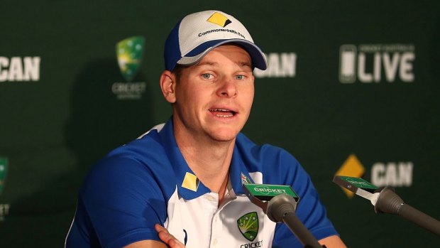 Backs current deal: Steve Smith speaks to the media at The Gabba.