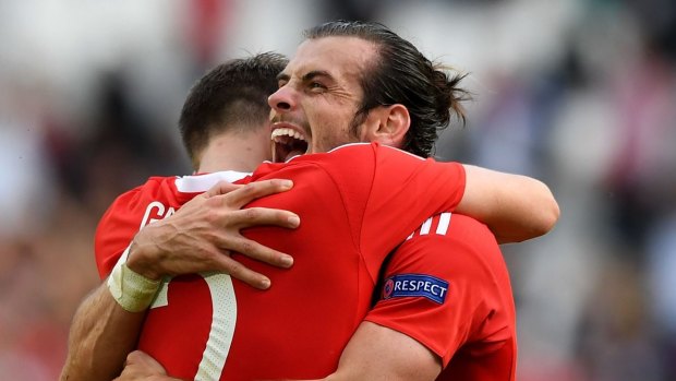 Gareth Bale (right) and Chris Gunter celebrate a win.