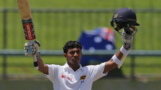 Ton up: Kusal Mendis celebrates scoring his maiden Test century.