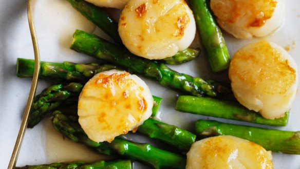 Adam Liaw's scallops and asparagus in silver sauce.